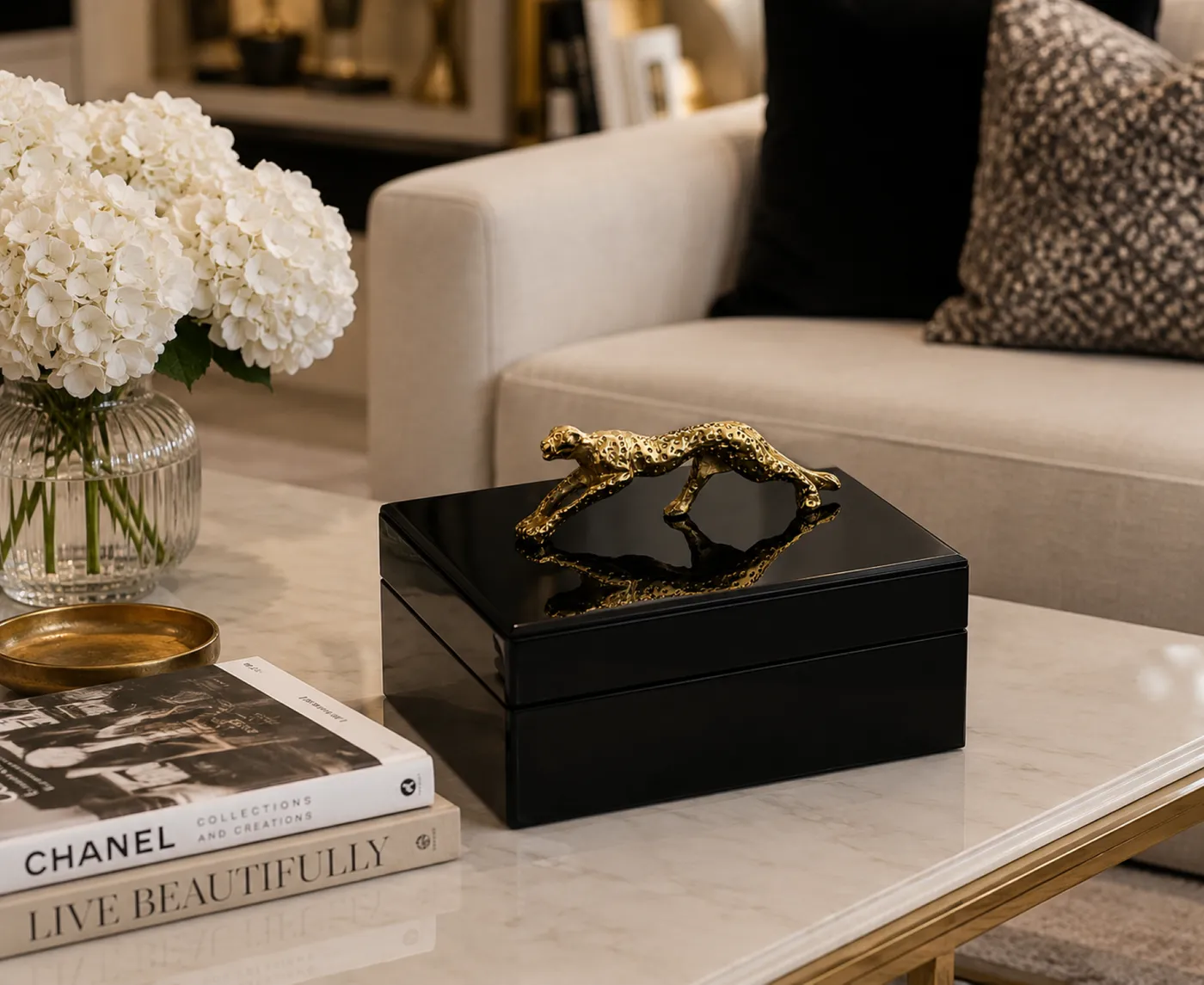 Gold leopard box styled in a living room